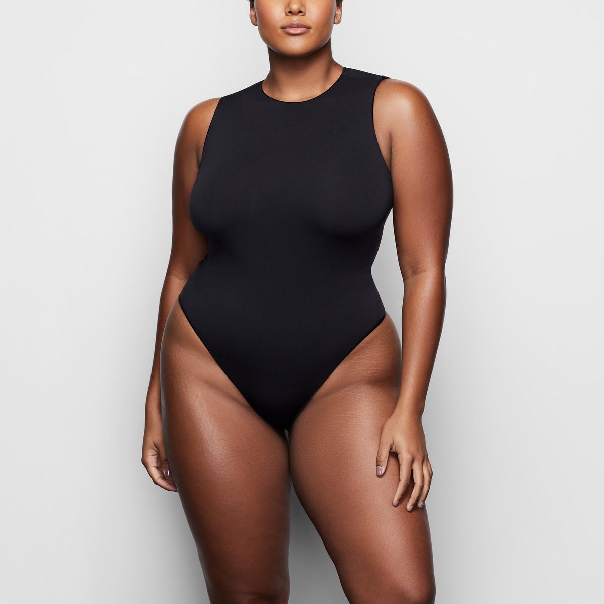 SKIMS Essential Crew Neck Ärmlös Bodysuit Onyx | US1264059